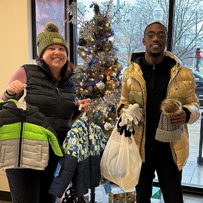 Harrison-Square---Coat-and-clothes-donation_edited Donating children's clothes during the holidays.