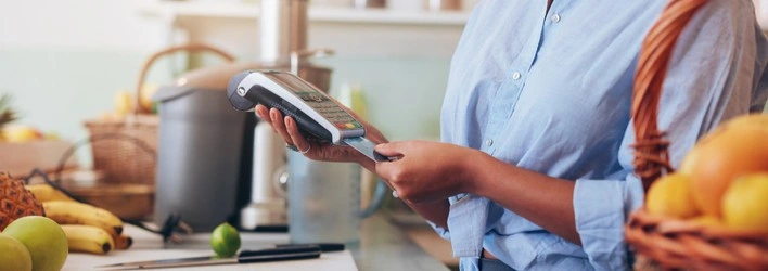 A customer paying at a store