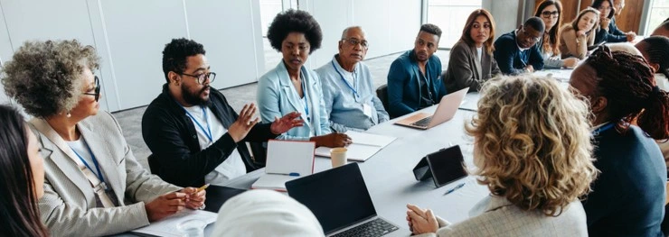 Employees having a meeting in an office