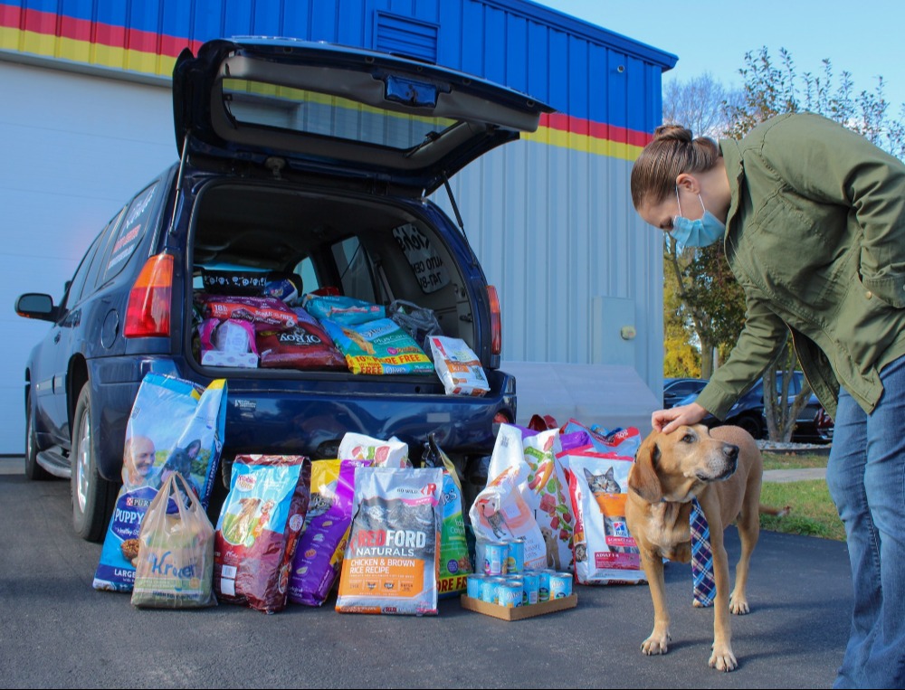 Fort Wayne Pet Food Pantry Volunteer Petting Dog