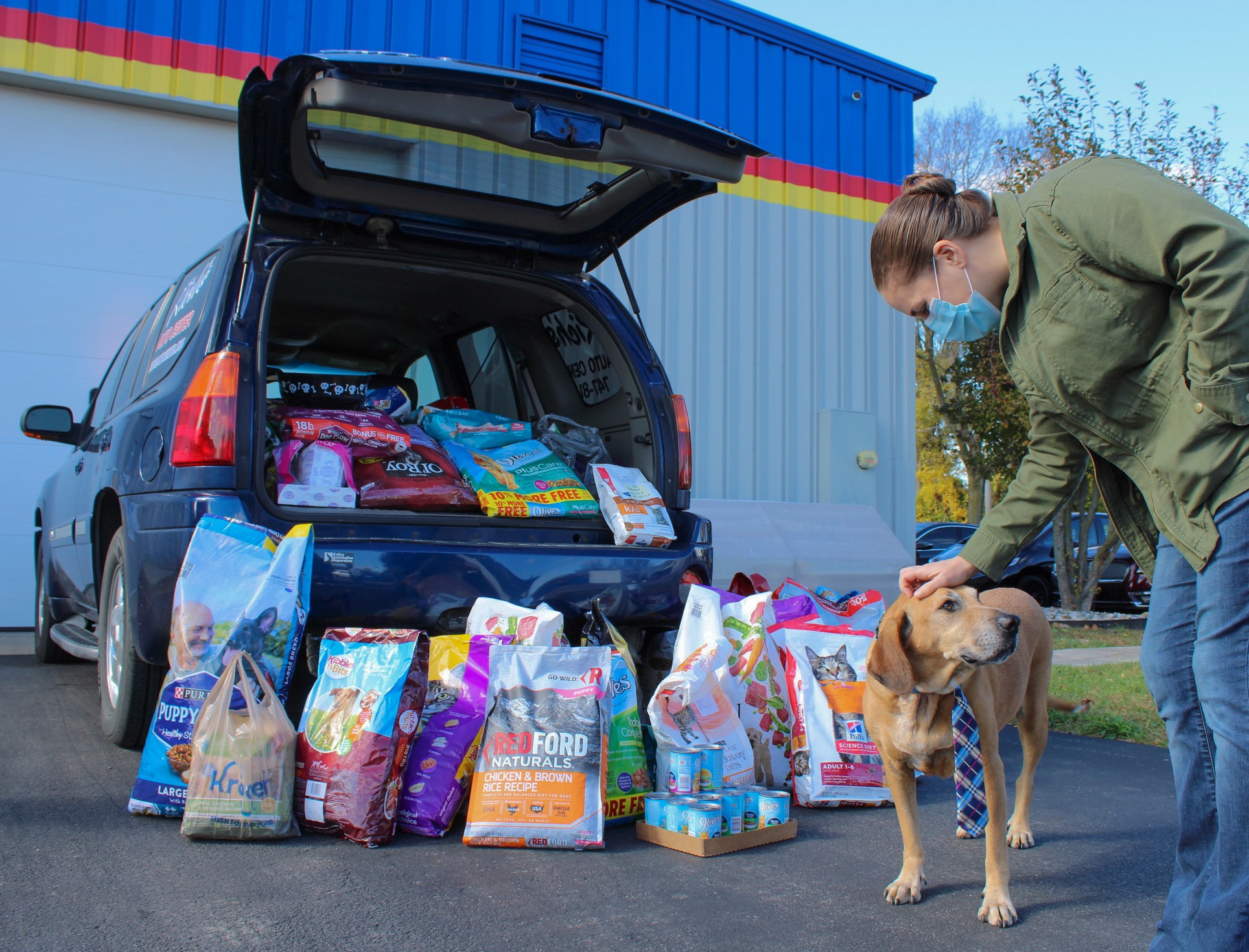 Fort Wayne Pet Food Pantry Volunteer Petting Dog