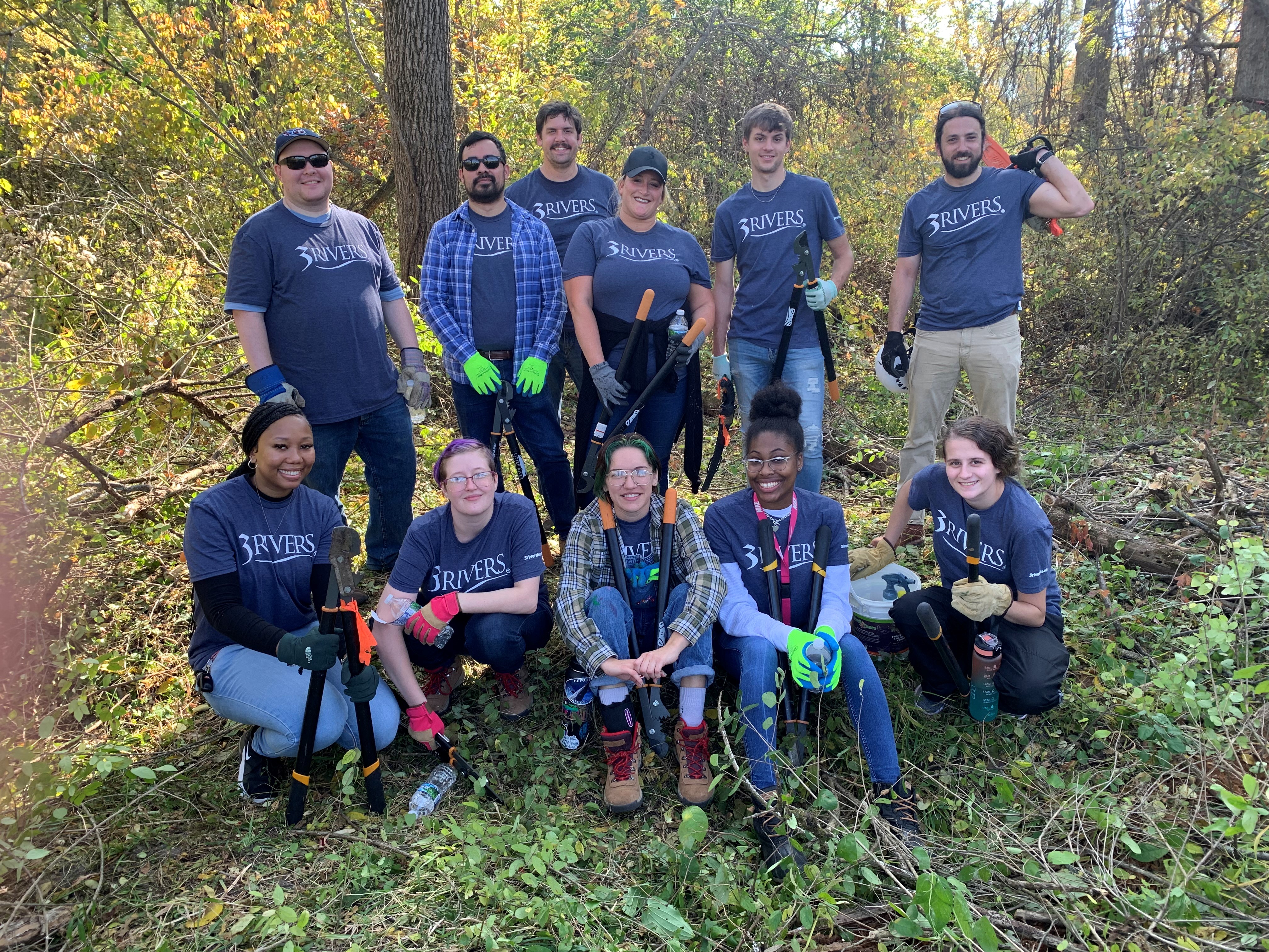 3Rivers employees volunteering at Little River Wetlands