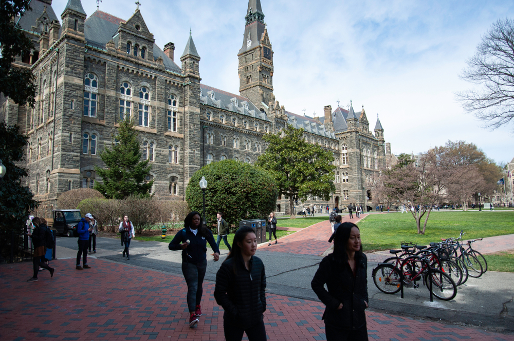 Students walking on college campus.