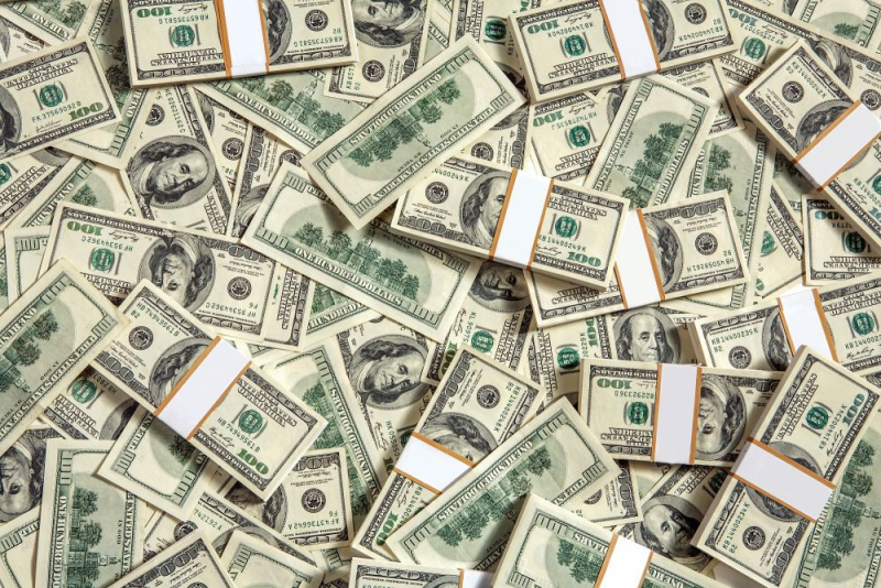 Image showing several bundles of hundred dollar bills.