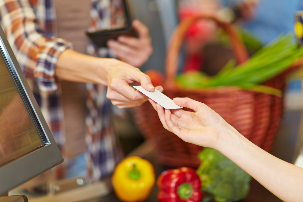 More Merchants Requring PIN for Purchases Made with EMV Cards | Image source: Shutterstock.com / Photographer: Robert Kneschke 