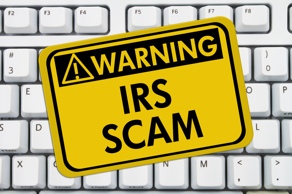 IRS Tax Scam Alert | Image source: Shutterstock.com / Photographer: Karen Roach