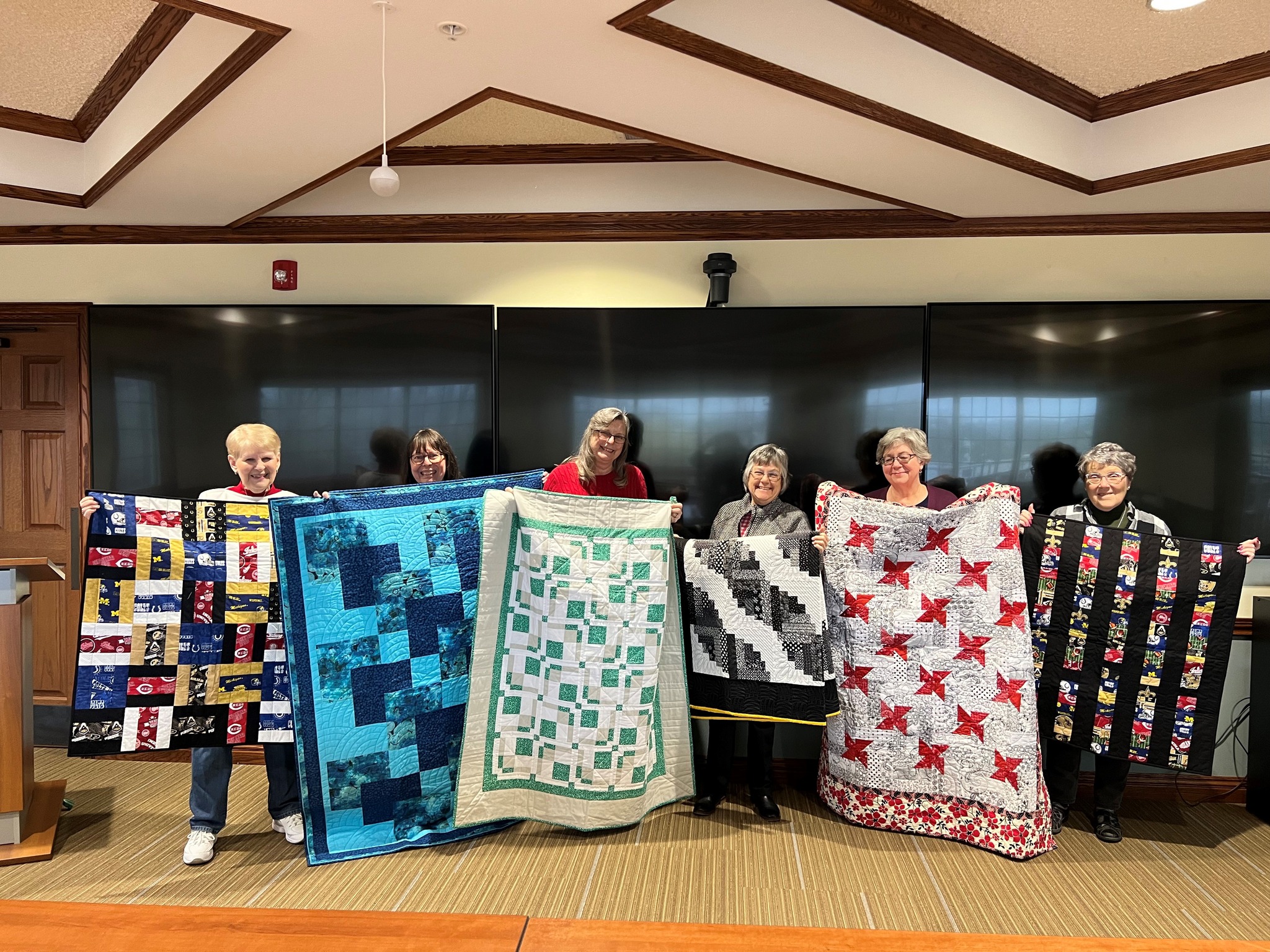 A donation of quilts to Stillwater Hospice.
