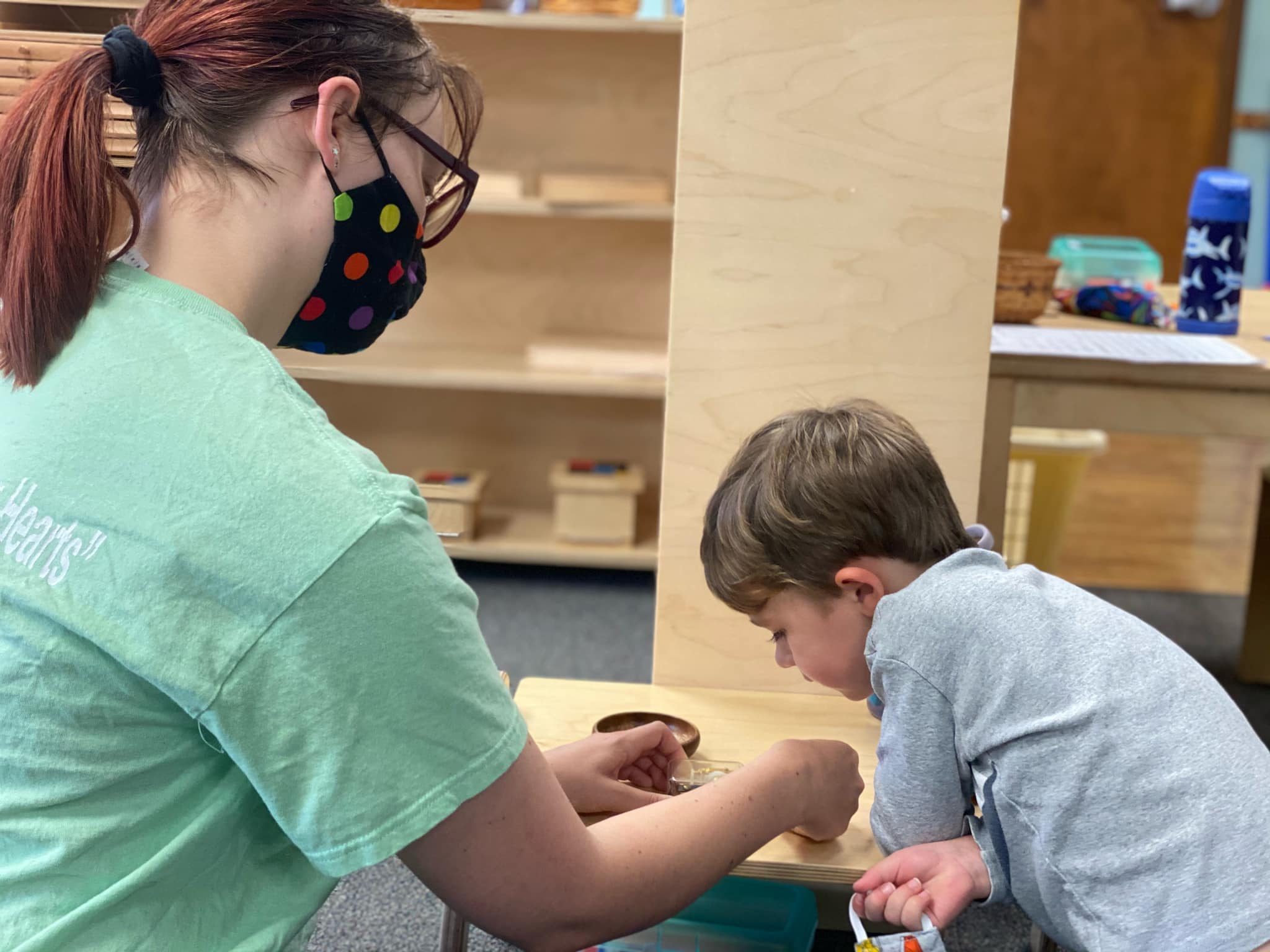 Southwest Montessori Academy Instructor with a Student